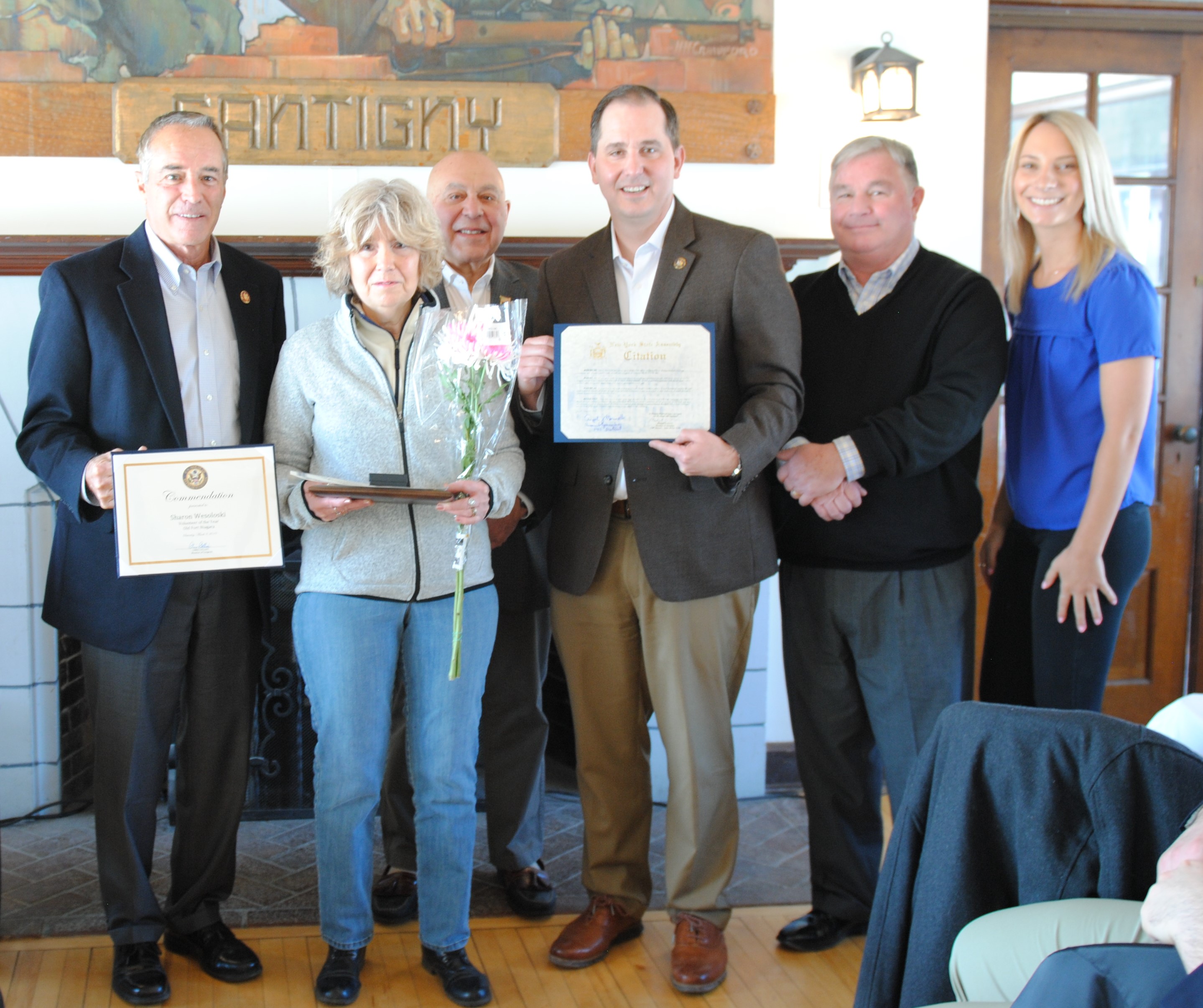 Sharon Wesoloski was named Old Fort Niagara Association's 2018 Volunteer of the Year and also received special awards from Congressman Chris Collins and State Assemblyman Mike Norris. State Assemblyman Angelo Morinello, Porter Town Councilman Tim Adamson and the fort's volunteer coordinator, Erika Schrader, are also pictured.